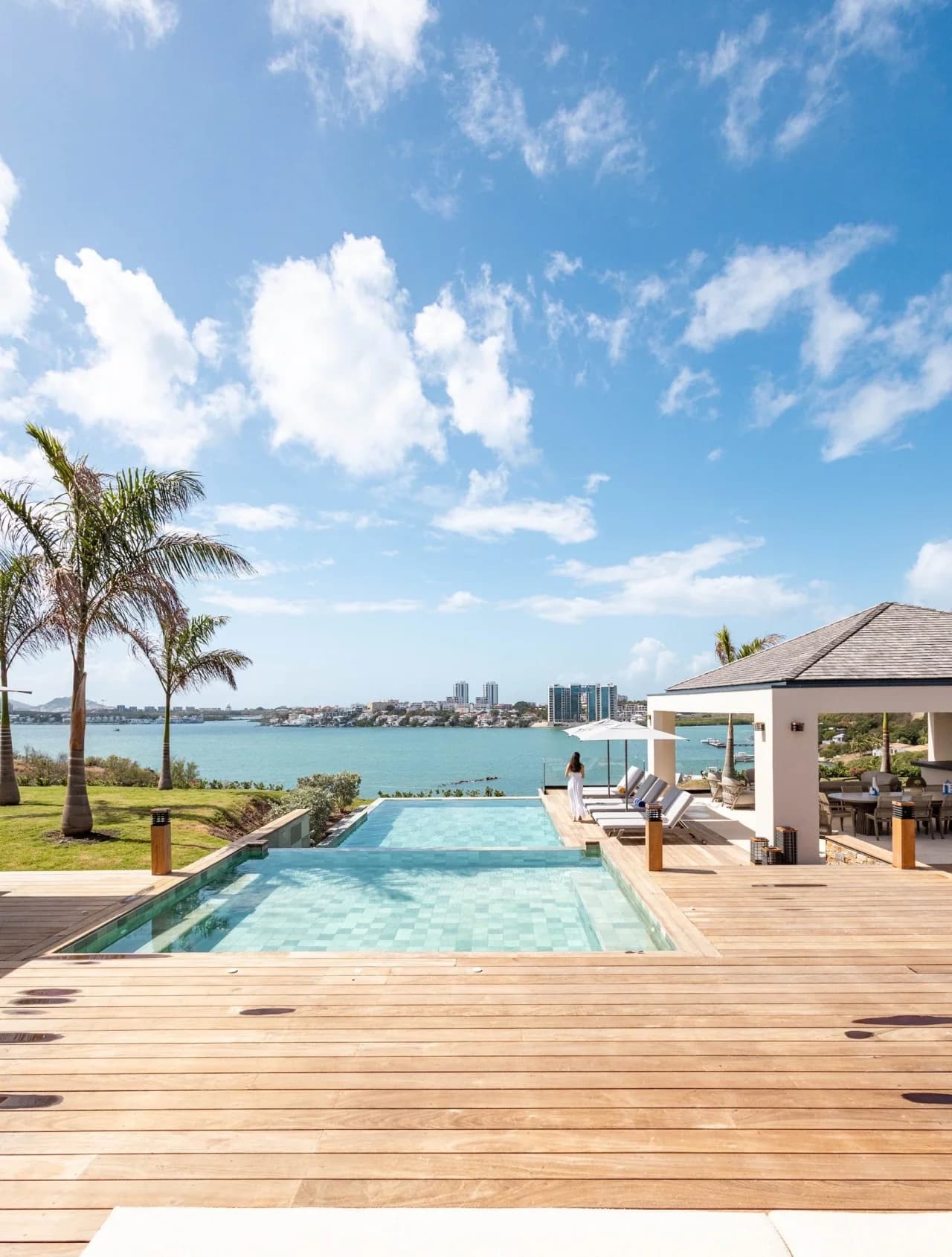 Heated pool, pavilion and palms