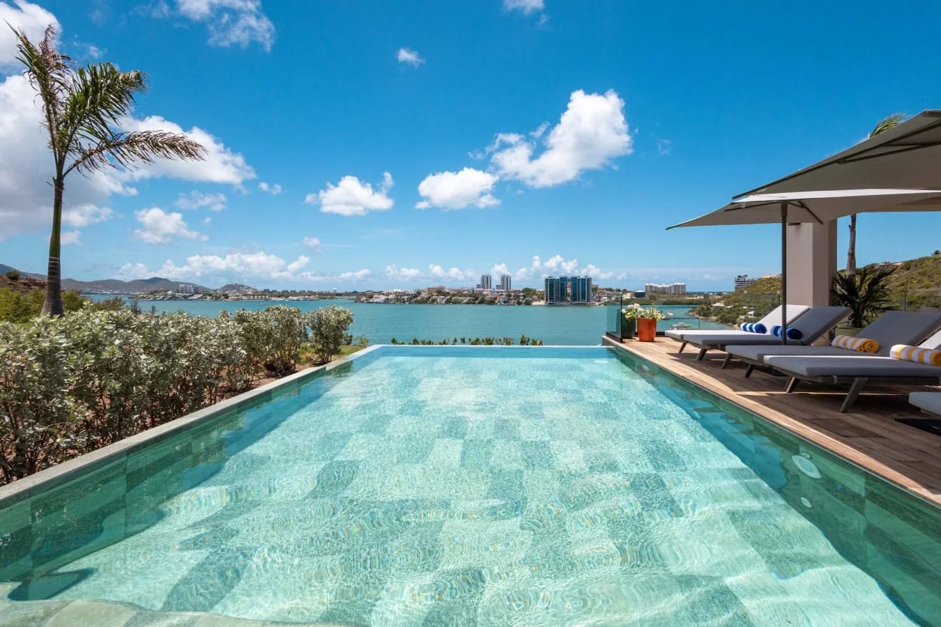 The pool, sun loungers and the lagoon